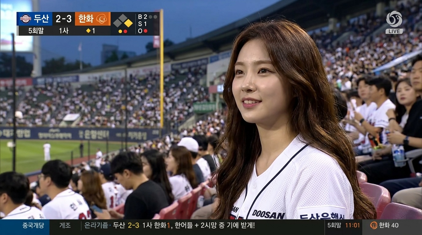 Korean Baseball AI live broadcast — brunette fan in Doosan Bears pinstripe jersey at evening KBO game